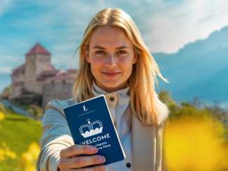 A woman holds up the WELCOME Experience Pass in front of Vaduz Castle in a field of flowers